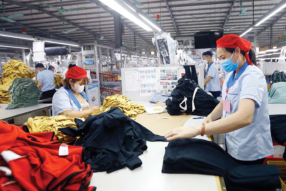 Việc ký kết các FTA giúp Việt Nam đẩy mạnh xuất khẩu hàng hóa, trong đó tăng mạnh nhất là hàng may mặc 	Ảnh: Đ.T