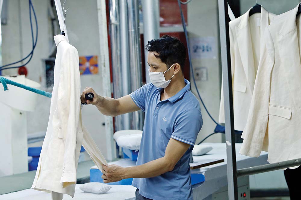 doanh nghiệp ngành dệt may, da giày lo ngại thêm gánh nặng chi phí khi sửa Điều 35, Nghị định 08/2015/NĐ-CP 	Ảnh: Đức Thanh