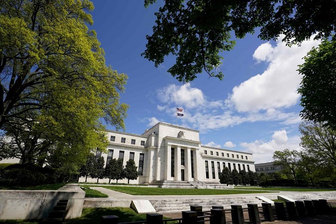 Fed có thể tăng lãi suất vượt ngưỡng kịch kim 5 - 5,25% nếu lạm phát tiếp tục nóng. Ảnh: AFP, 