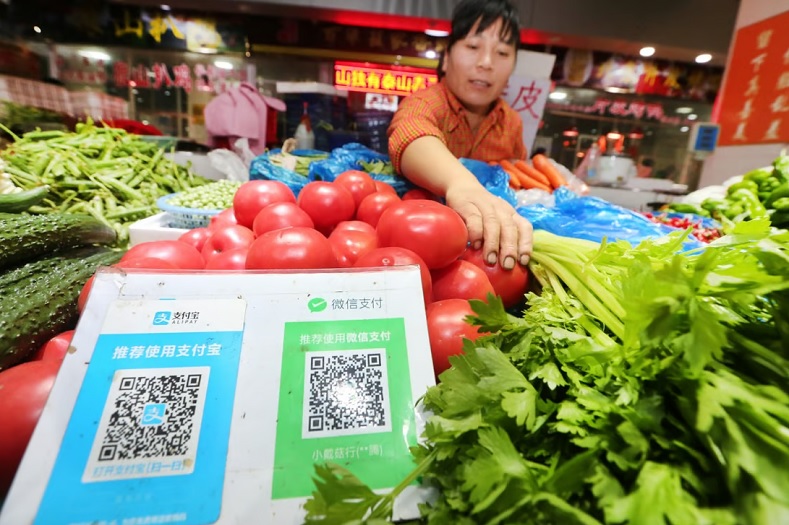 Giá thực phẩm và dịch vụ là những nhân tố chính thúc đẩy lạm phát tháng 4 của Trung Quốc. Ảnh: AFP