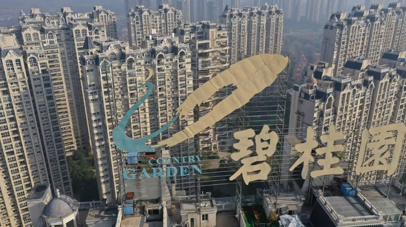 Tập đoàn bất động sản Trung Quốc Country Garden bị các nhà đầu tư công bố vỡ nợ do không thể trả lãi 15,4 triệu USD cho trái phiếu bằng USD của mình sau khi được gia hạn đến lần thứ 2 vào ngày 18/10/2023. Ảnh: AFP