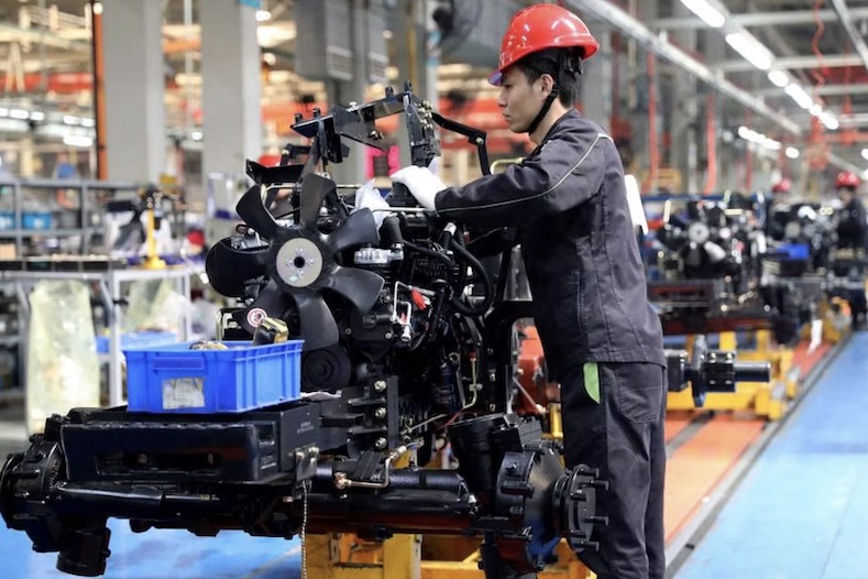 Chỉ số PMI chính thức của Trung Quốc đã tăng lên 50,8 điểm trong tháng 3, từ mức 49,1 của tháng 2. Ảnh: AFP