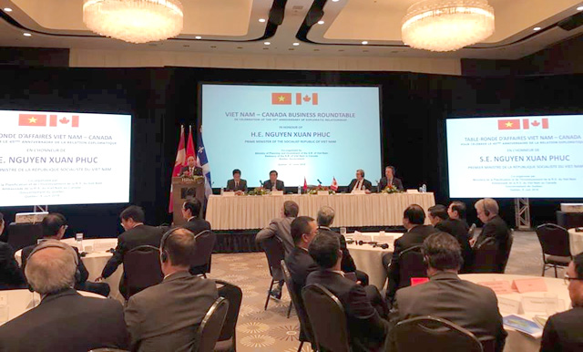 Thủ tướng Chính phủ Nguyễn Xuân Phúc phát biểu tại Tọa đàm Doanh nghiệp Việt Nam - Canada. Ảnh: TA