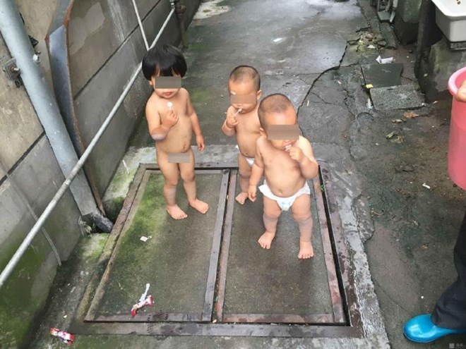 3 đứa trẻ trên đường. (Nguồn: QQ)