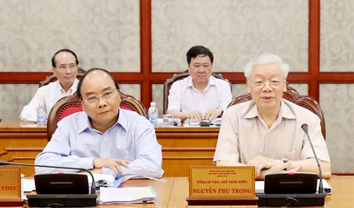 Tổng Bí thư, Chủ tịch nước Nguyễn Phú Trọng và Thủ tướng Nguyễn Xuân Phúc tại cuộc họp. Ảnh: TTXVN