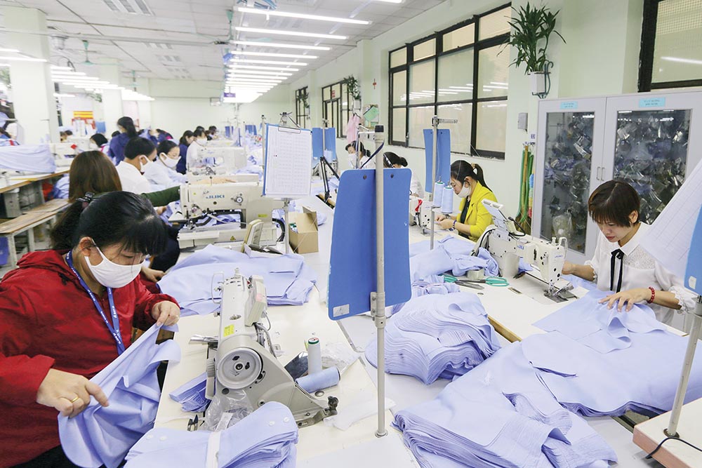 Chủ động nguyên liệu thỏa mãn quy tắc xuất xứ sẽ giúp ngành dệt may tăng trưởng xuất khẩu   Ảnh: Đức Thanh