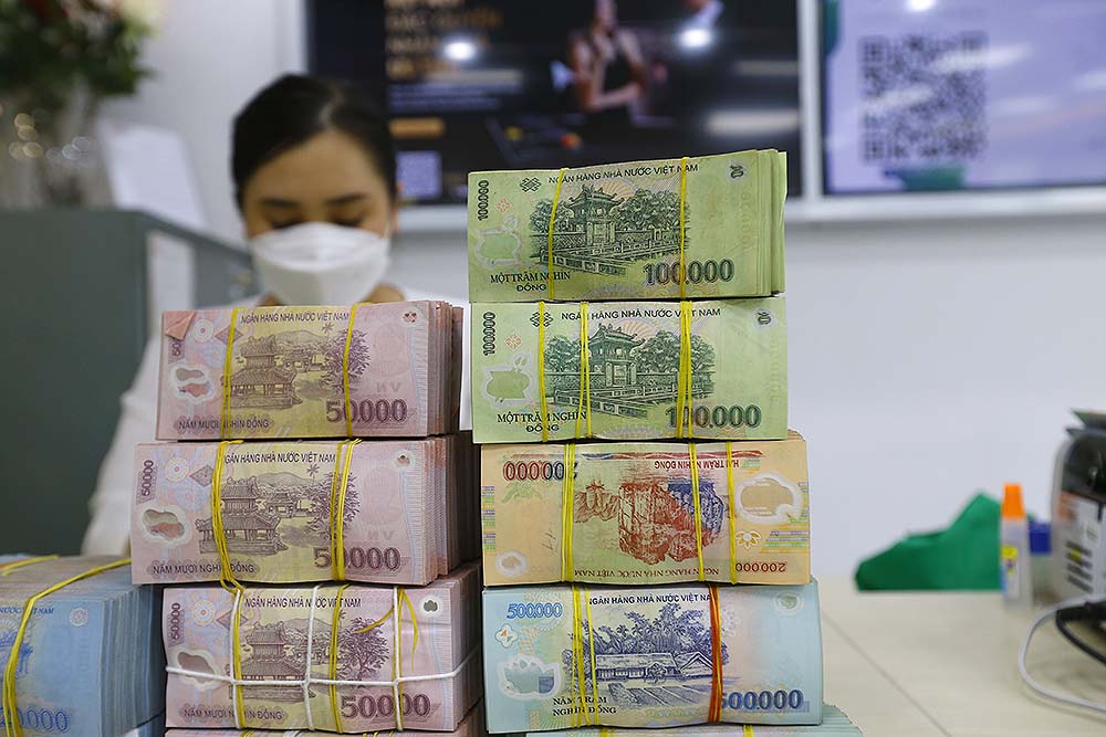 Thời gian qua, cơ cấu tín dụng phù hợp với cơ cấu nền kinh tế, đáp ứng nhu cầu vốn của người dân và doanh nghiệp	ảnh: d.minh