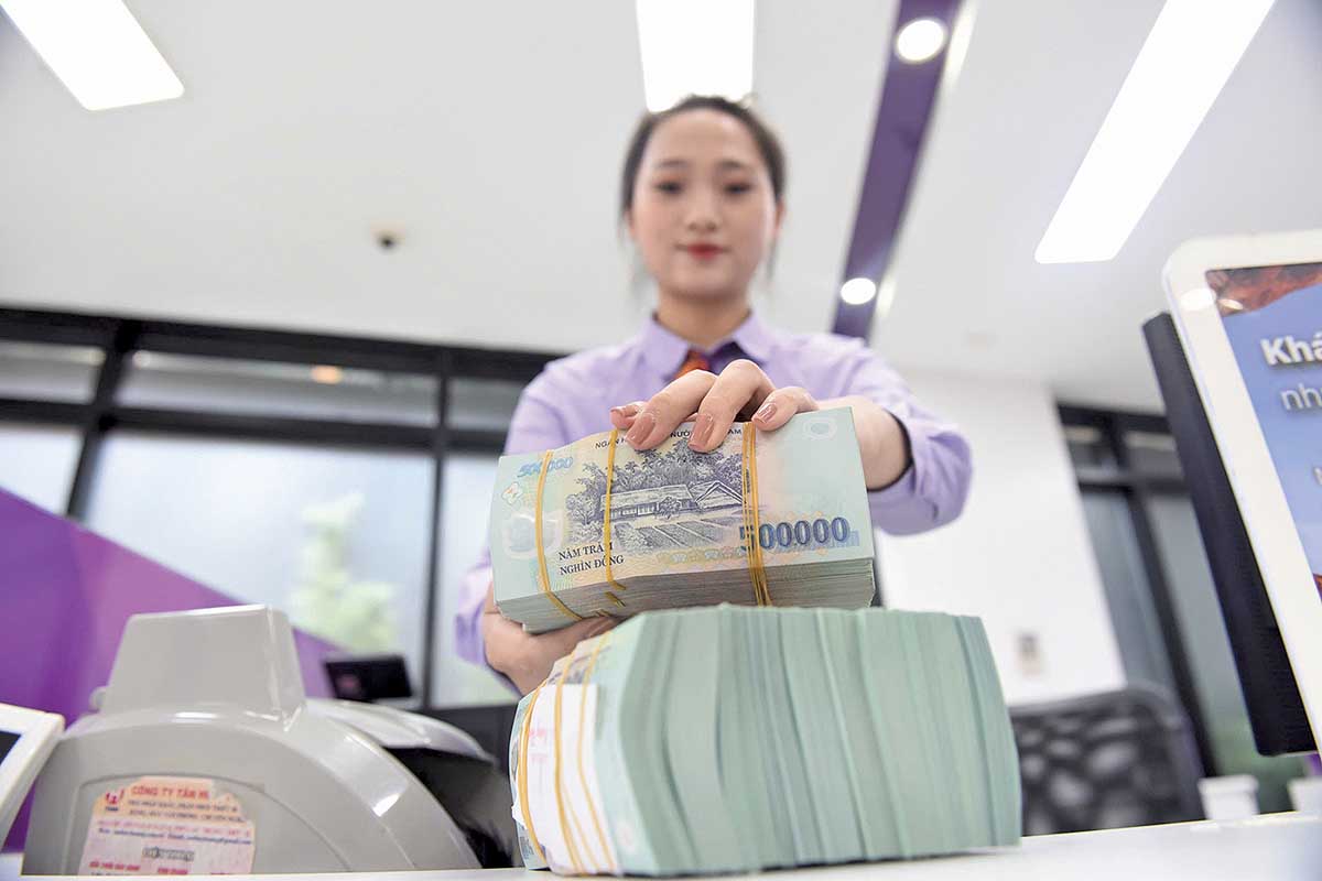 Ng&agrave;nh ng&acirc;n h&agrave;ng đang k&iacute;ch hoạt cuộc cải c&aacute;ch lớn, nắn lại d&ograve;ng tiền, tối ưu h&oacute;a vận h&agrave;nh (Ảnh: Dũng Minh)