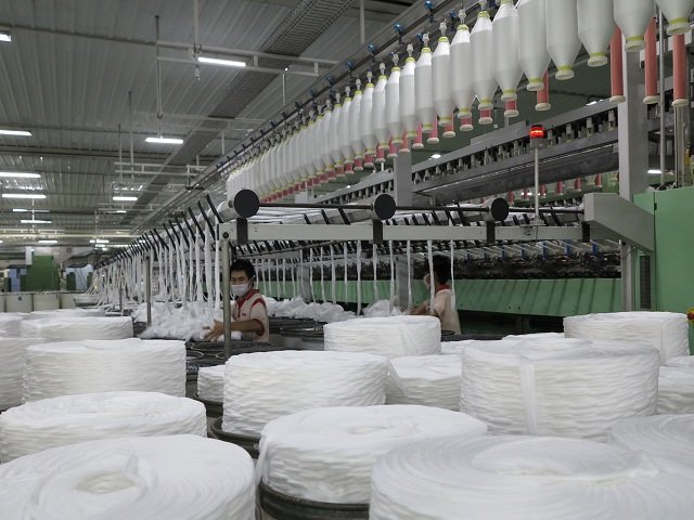 Vinatex đang phát triển mạnh chuỗi sản xuất sợi, dệt, nhuộm, may.