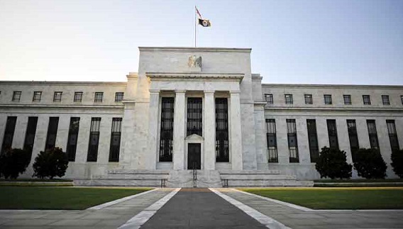 Chủ tịch Fed Jerome Powell cho biết Fed sẽ tiếp tục hạ lãi suất nếu có bằng chứng cho thấy kinh tế Mỹ đang chững lại. Ảnh: AFP