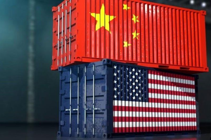 Thương chiến Mỹ - Trung là một trong những mối họa lớn nhất đối với tăng trưởng toàn cầu và các thị trường tài chính trên thế giới. Ảnh: AFP