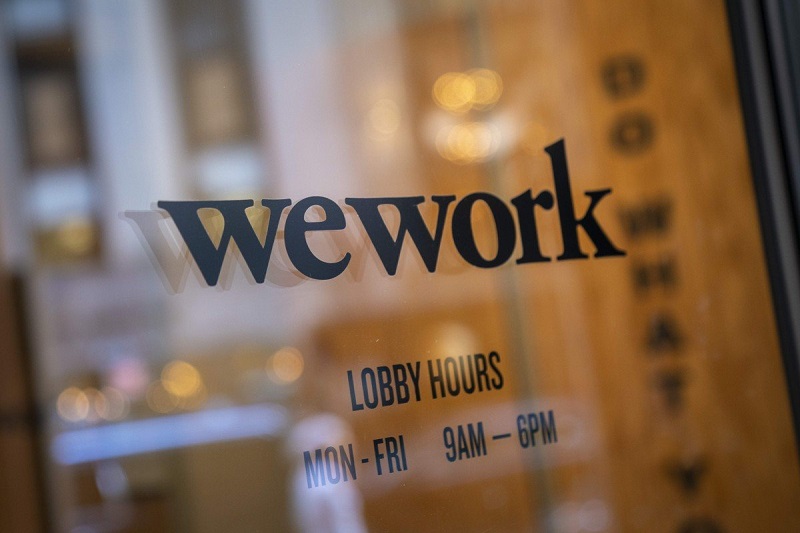 WeWork dự kiến cắt giảm hàng nghìn việc làm trong tuần này. Ảnh: AFP