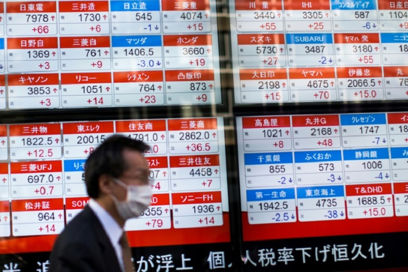 Chỉ số Nikkei 225 của Nhật Bản trượt nhẹ phiên chiều nay 10/12, còn chỉ số Topix mất điểm không đáng kể. Ảnh: AFP