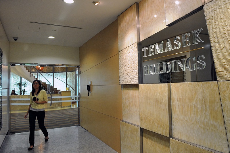 Thỏa thuận giữa Temasek Holdings và tập đoàn BlackRock với ngân hàng Xây dựng Trung Quốc đạt được sau khi chính phủ Trung Quốc tiếp tục mở cửa thị trường tài chính cho nhà đầu tư “ngoại”. Ảnh: AFP