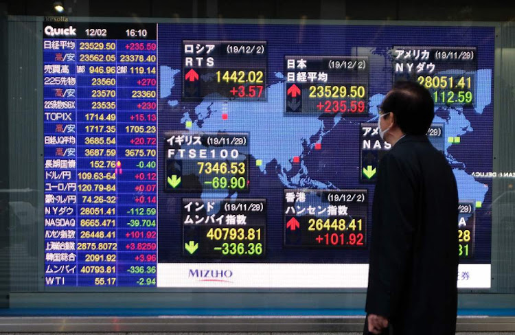 Sau cú trượt sâu 1,91% phiên 6/1, chỉ số Nikkei 225 của Nhật Bản sáng nay 7/1 tăng 0,66% ngay đầu phiên. Ảnh: AFP