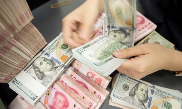 ngân hàng Trung ương Trung Quốc khẳng định hỗ trợ các doanh nghiệp đủ điều kiện để họ khởi động lại hoạt động sản xuất kinh doanh sớm nhất có thể. Ảnh: AFP