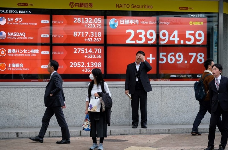 Chỉ số Nikkei 225 quay đầu tăng 1,08% sau phiên mất hơn 1% trước đó. Ảnh: AFP