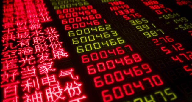 Sắc đỏ bao phủ thị trường chứng khoán Hong Kong trong phiên giao dịch sáng nay 4/5 khi cổ phiếu của “ông lớn” công nghệ Tencent trượt 3,55%. Ảnh: AFP