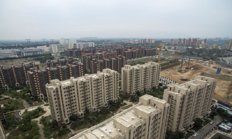 Doanh số bất động sản tính theo mét sàn tại Trung Quốc tăng vọt 9,7% trong tháng 5. Ảnh: AFP