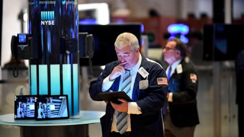 Dow Jones trượt nhẹ xuống 25.690,35 điểm lúc mở phiên giao dịch 10/7 . Ảnh: AFP
