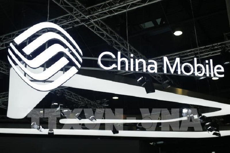 China Mobile là 1 trong 3 doanh nghiệp viễn thông lớn nhất Trung Quốc sắp bị Sàn chứng khoán New York hủy niêm yết. Ảnh: AFP/TTXVN