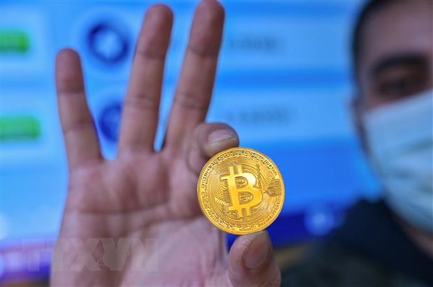 Đồng tiền kỹ thuật số Bitcoin. Ảnh: AFP/TTXVN