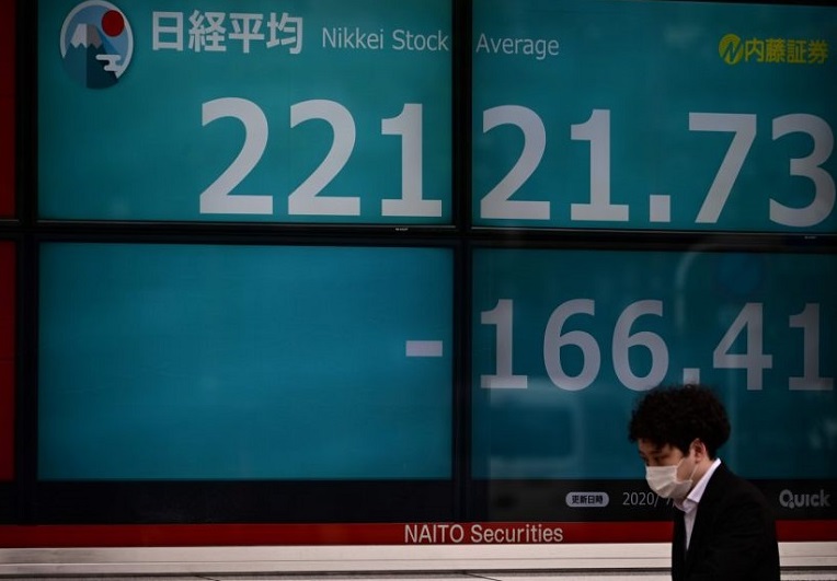 Chỉ số Nikkei 225 giảm 0,19% trong ngày giao dịch 8/6. Ảnh tư liệu: AFP 