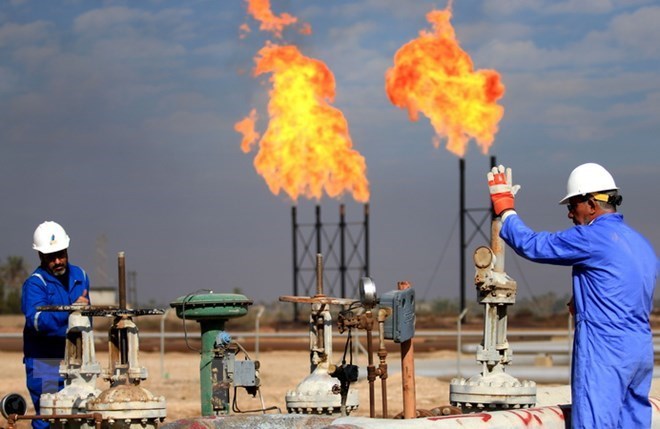 Thị trường dầu mỏ tuần tới sẽ hướng trọng tâm vào những điều chỉnh triển vọng nhu cầu dầu mỏ cho năm 2022 từ OPEC và Cơ quan Năng lượng Quốc tế (IEA). Ảnh: AFP