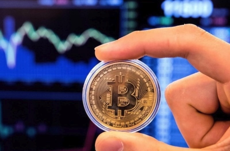 Giá Bitcoin đã bước vào vùng dự báo 95.000 - 100.000 USD như dự báo. Ảnh: AFP