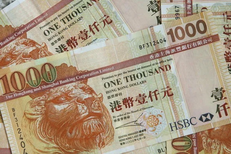 Nhu cầu đô la Hong Kong trên thị trường vốn Hong Kong gần đây tăng cao do các nhà đầu tư Trung Quốc ồ ạt đổ tiền vào cổ phiếu Hong Kong. Ảnh: AFP{