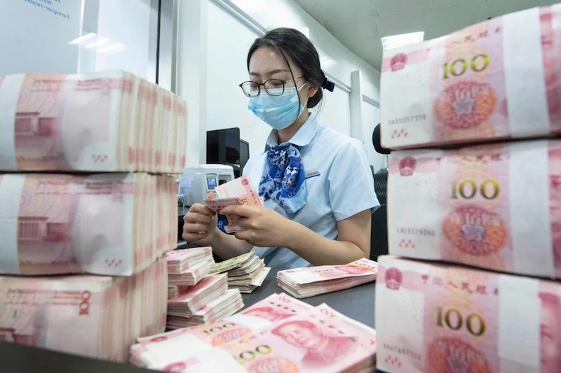  Lãi suất LPR kỳ hạn 1 năm ảnh hưởng đến các khoản vay của doanh nghiệp và hầu hết các hộ gia đình ở Trung Quốc, trong khi LPR kỳ hạn 5 năm đóng vai trò là chuẩn mực cho lãi suất thế chấp. Ảnh: AFP