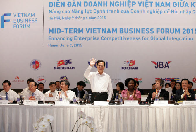 Thủ tướng Nguyễn Tấn Dũng khẳng định, Chính phủ cam kết tiếp tục tập trung cải thiện môi trường đầu tư kinh doanh, nâng cao năng lực cạnh tranh Quốc gia (Ảnh Đức Thanh)