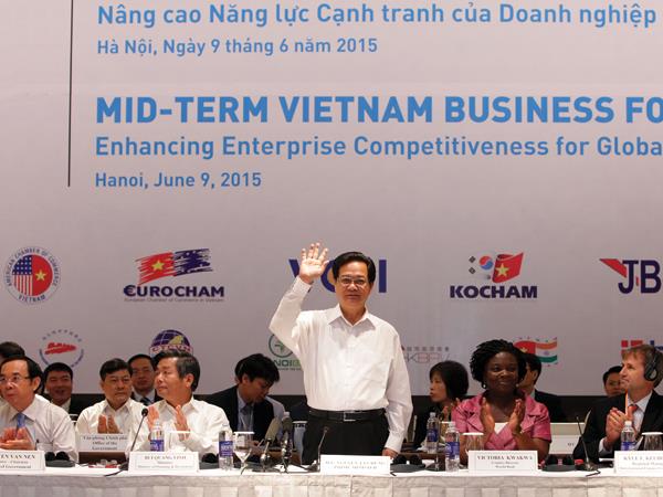 Thủ tướng Nguye?n Tấn Du?ng cho biết, Chính phủ Việt Nam cam kết tạo mọi thuận lợi để doanh nghiệp và nền kinh tế nâng cao năng lực cạnh tranh trong hội nhập	. Ảnh: Đ.T