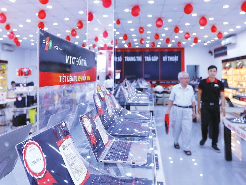 doanh nghiệp Việt Nam đang rất cần vốn dài hạn để đáp ứng chiến lược phát triển của mình. Trong ảnh: FPT Shop - một trong hai chuỗi bán lẻ hàng công nghệ hiện tại của FPT Retail. Ảnh: Đức Thanh