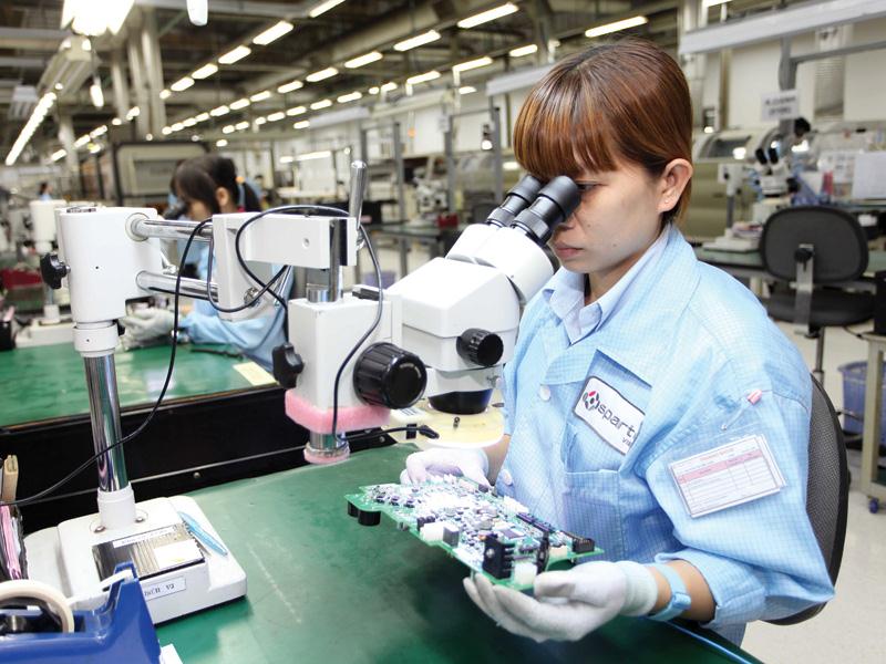 Sản xuất tại Tập đoàn sản xuất các sản phẩm điện tử, điện cơ Sparton  Vietnam. Ảnh: Lê Toàn