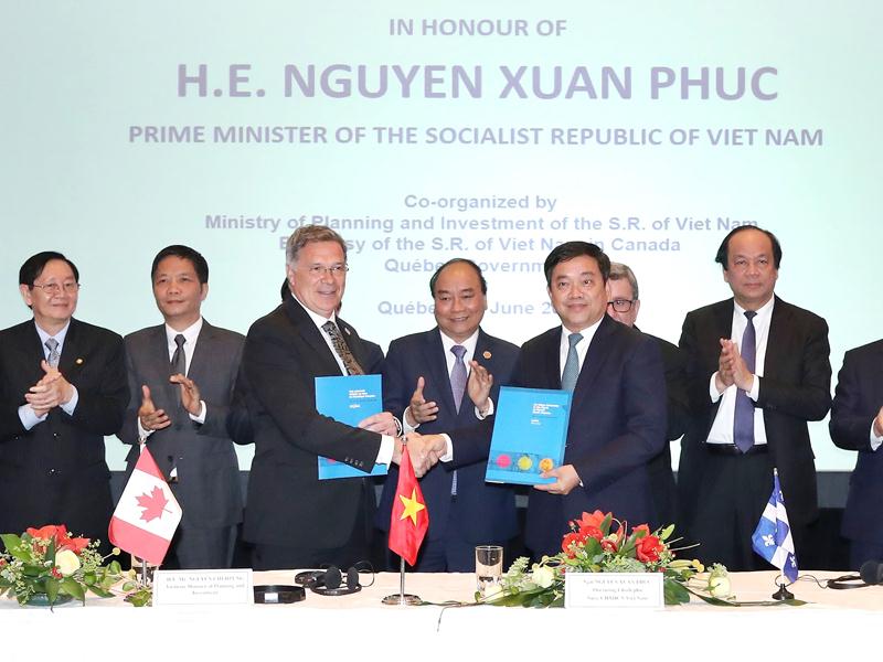 Thủ tướng Nguyễn Xuân Phúc dự Tọa đàm doanh nghiệp Việt Nam - Canada. Ảnh: TTXVN
