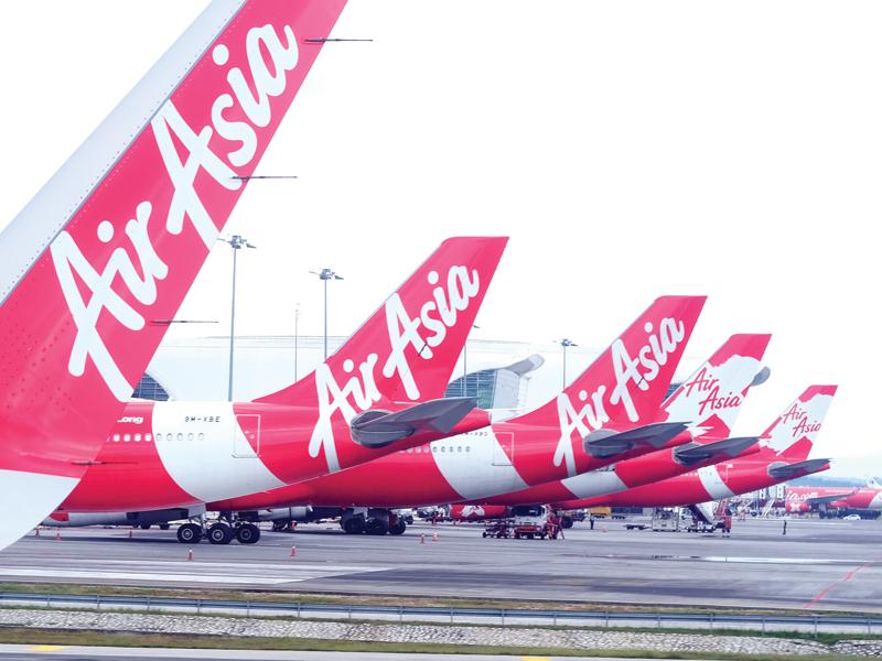 Air Asia Bhd đang cùng với Tập đoàn Thiên Minh tìm cửa bước vào thị trường hàng không giá rẻ của Việt Nam, dù không dễ