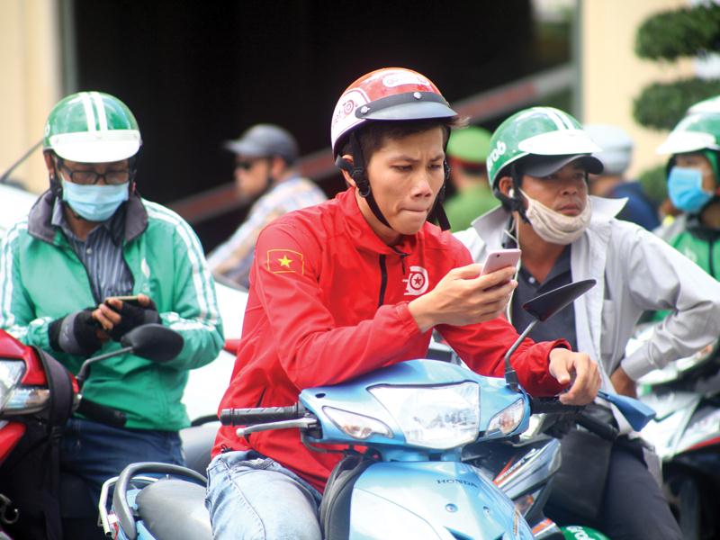 Từ ngày 20/7, thương hiệu Gojek Việt Nam sẽ thay màu áo GoViệt trên bản đồ ứng dụng gọi xe ở Việt Nam. Ảnh: Lê Toàn