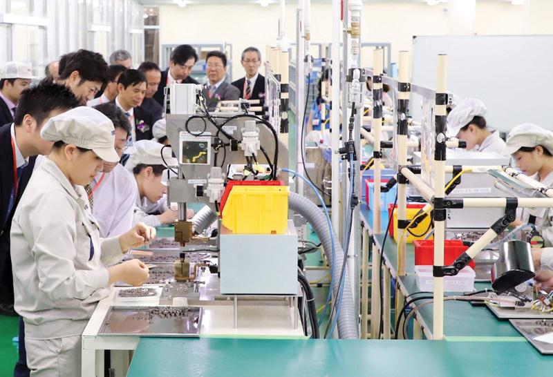 Dây chuyền sản xuất thiết bị ly hợp điện từ cho máy in và các thiết bị chính xác khác của Nhà máy NMS (Nhật Bản) tại Hà Nam. Ảnh: Đức Thanh