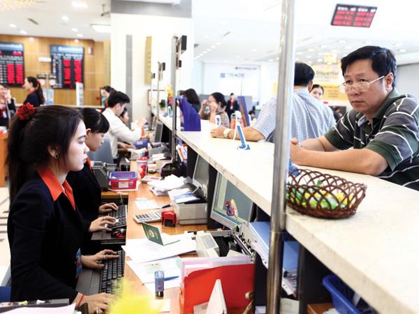 ngân hàng Việt Nam đang trong cuộc đua nâng cao năng lực tài chính để cạnh tranh. Ảnh: Đ.T