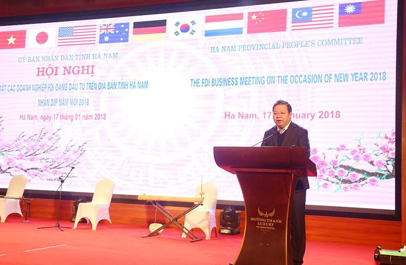 Chủ tịch UBND tỉnh Hà Nam Nguyễn Xuân Đông phát biểu tại Hội nghị gặp mặt các doanh nghiệp FDI đang đầu tư trên địa bàn tỉnh Hà Nam nhân dịp năm mới xuân Mậu Tuất 2018.