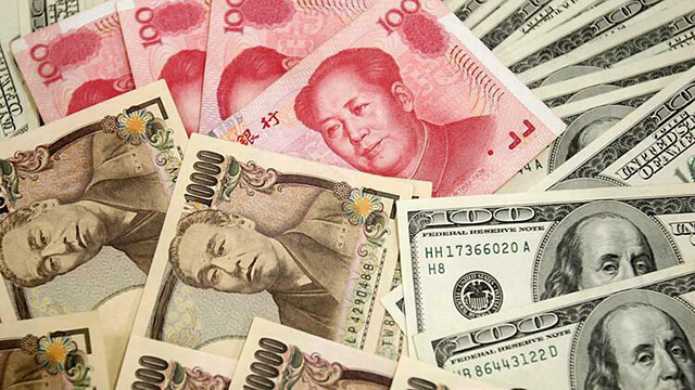 Yen Nhật, nhân dân tệ Trung Quốc và đôla Mỹ. Ảnh: Reuters