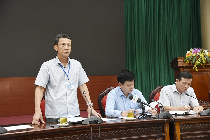Phó Chủ tịch UBND quận Bắc Từ Liêm Nguyễn Kim Vinh thông tin tại hội nghị.