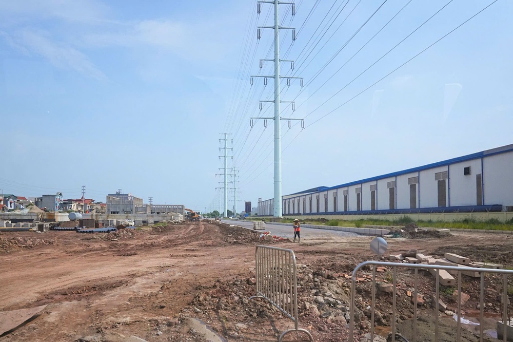 Hiện trạng triển khai Dự án đầu tư xây dựng và kinh doanh kết cấu hạ tầng Khu công nghiệp Tân Trường mở rộng. Ảnh: Đàm Thanh