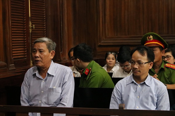 Bị cáo Lê Văn Thanh (bên trái) và bị cáo Nguyễn Thanh Chương (bên phải)