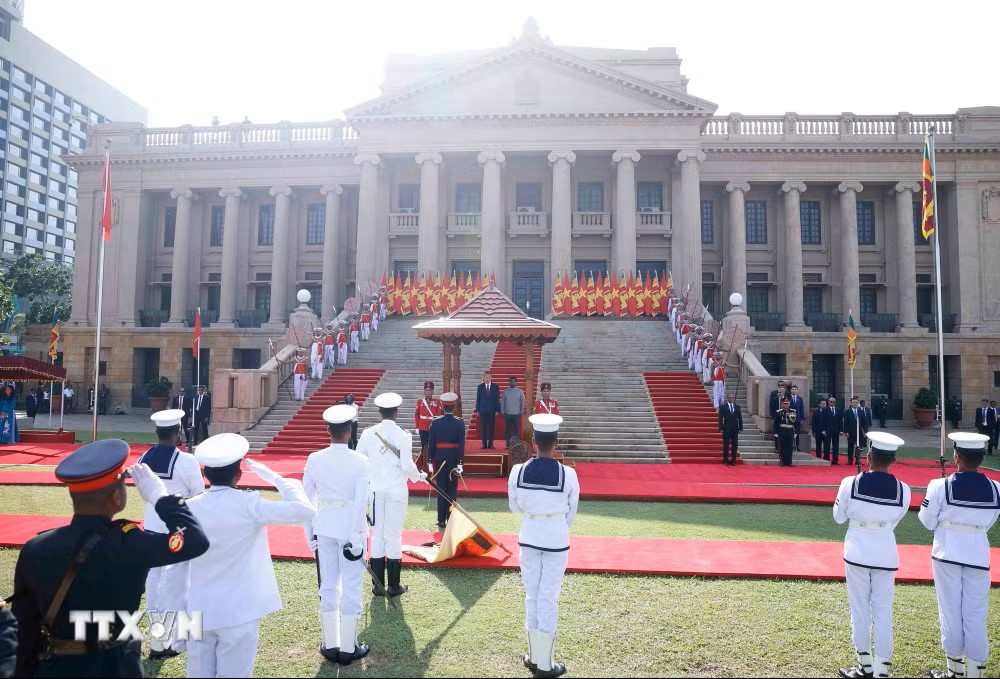 ttxvn-le-don-tong-bi-thu-chu-tich-nuoc-to-lam-tham-cap-nha-nuoc-sri-lanka-3.jpg