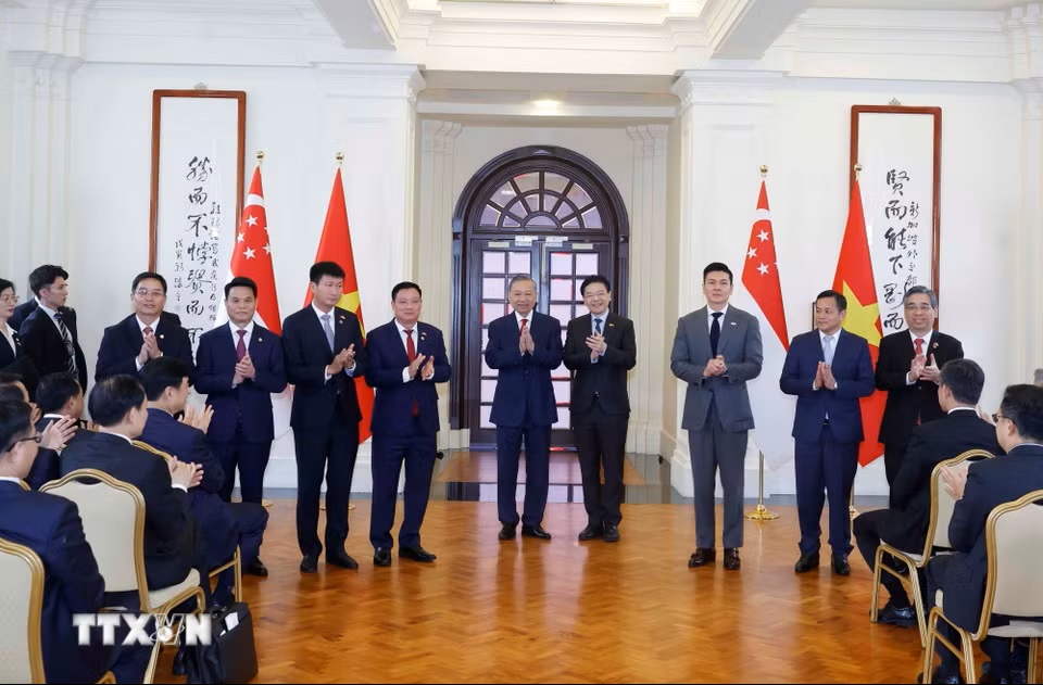 tong-bi-thu-chu-tich-nuoc-to-lam-va-thu-tuong-singapore-chung-kien-le-trao-van-kien-hop-tac-giua-hai-nuoc-29-6.jpg