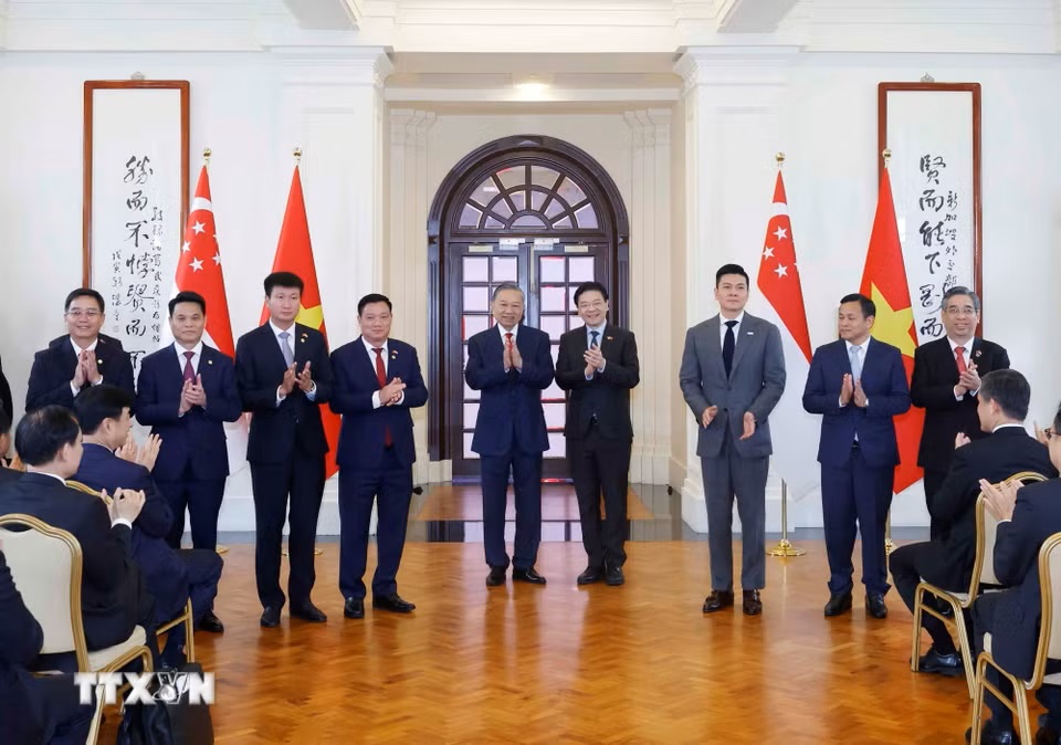 tong-bi-thu-chu-tich-nuoc-to-lam-va-thu-tuong-singapore-chung-kien-le-trao-van-kien-hop-tac-giua-hai-nuoc-29-7.jpg