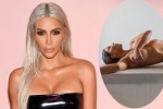 Kim Kardashian tung ảnh khỏa thân quảng bá nước hoa