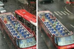 Hành khách đội mưa ngồi xe buýt 2 tầng ở Hà Nội gây xôn xao